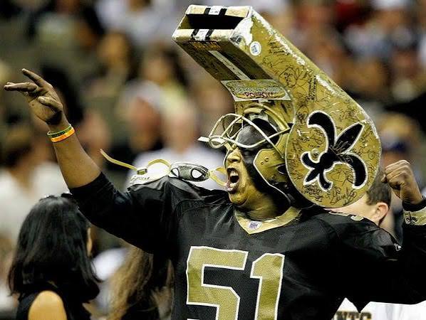 Whistle Monsta cheering in his gold whistle helmet